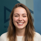 Portrait of a smiling young North American woman, looking happy and content.
